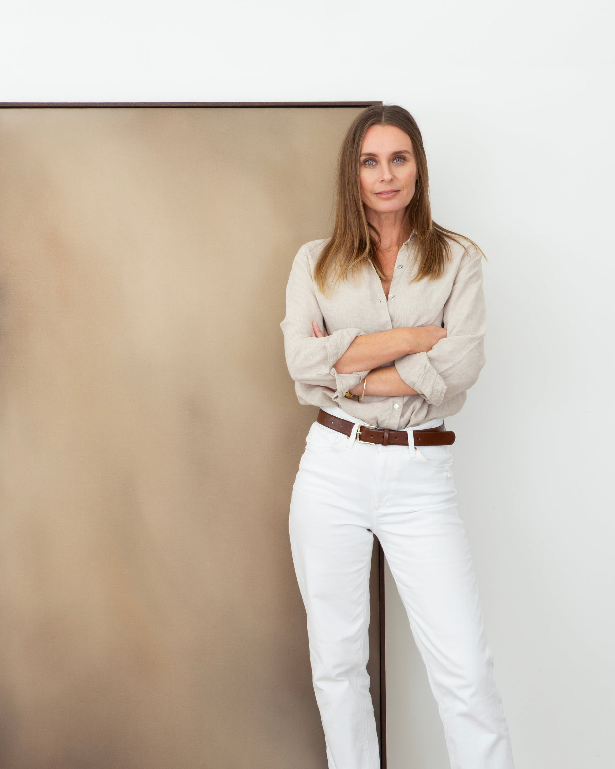 Artist Michelle Wilkin with her artwork