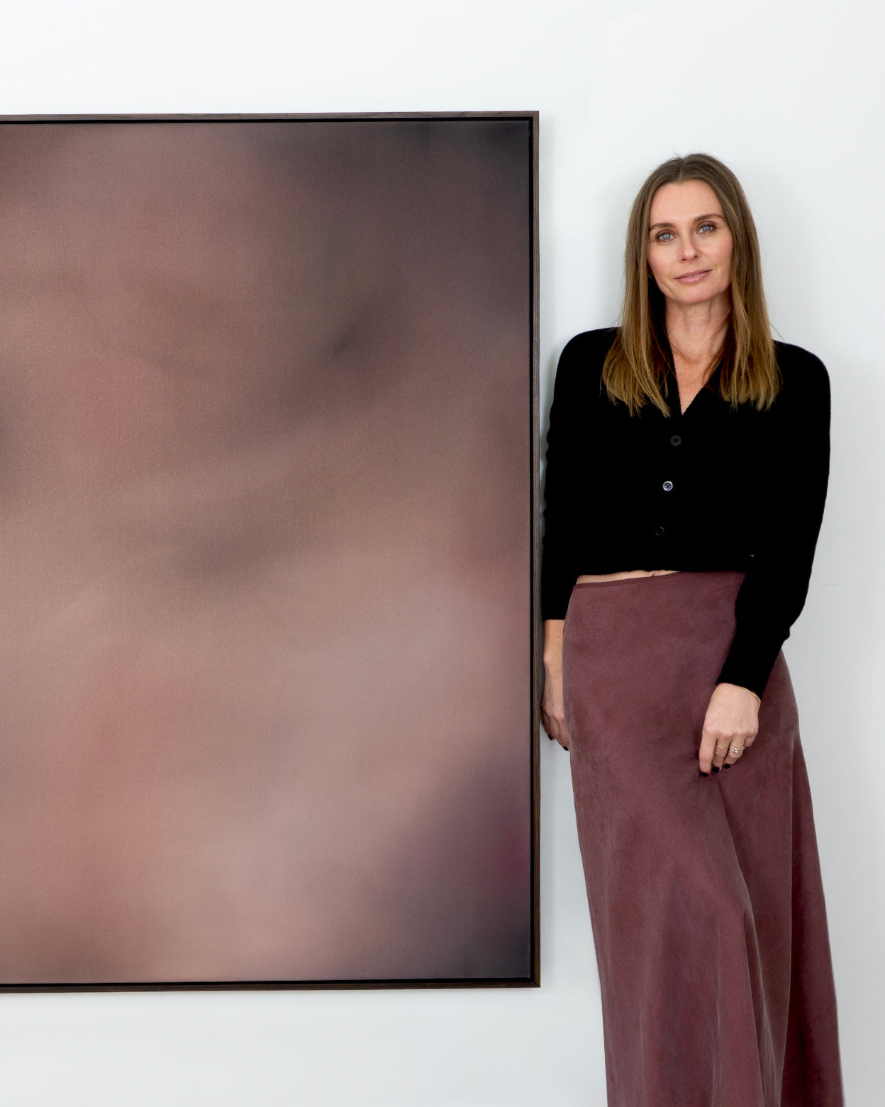 Artist Michelle Wilkin with a recent commission artwork 'Bed of Roses'