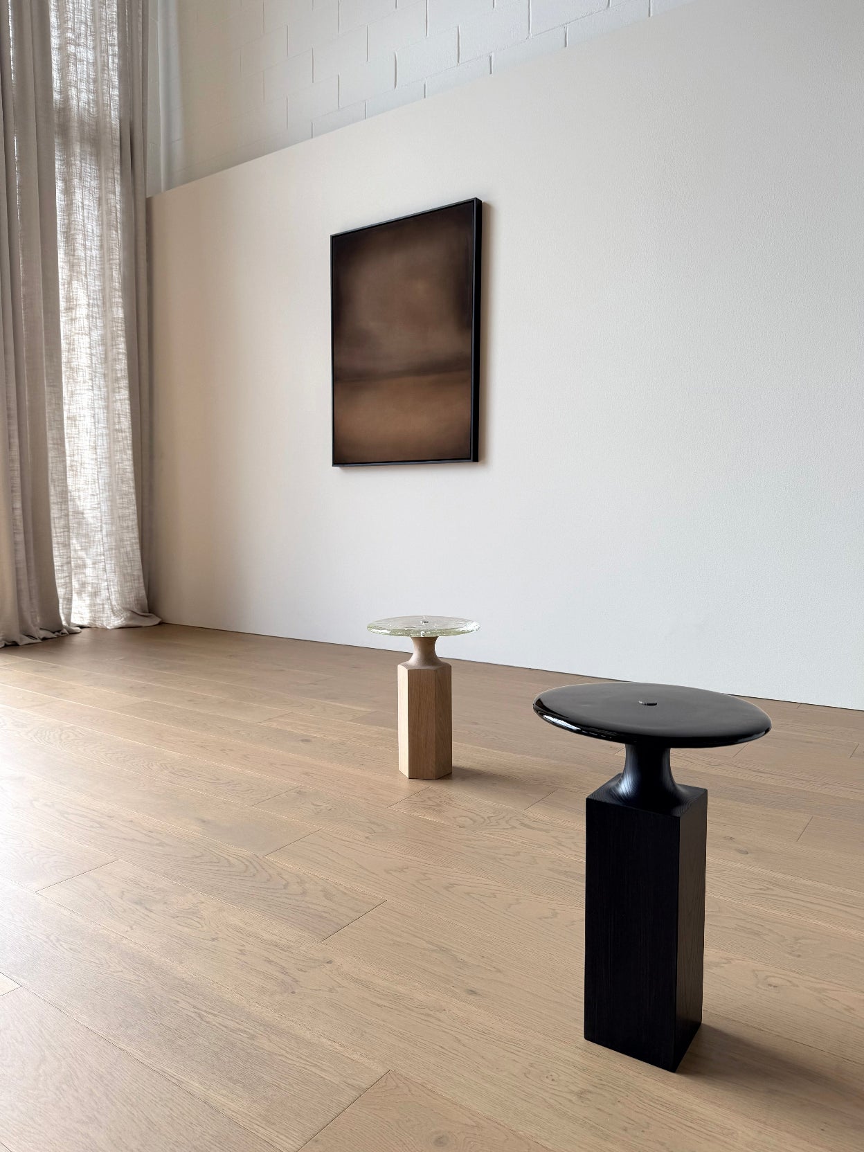 Michelle Wilkin's artwork 'State of Bliss PM' hanging within the Woodwrights furniture showroom